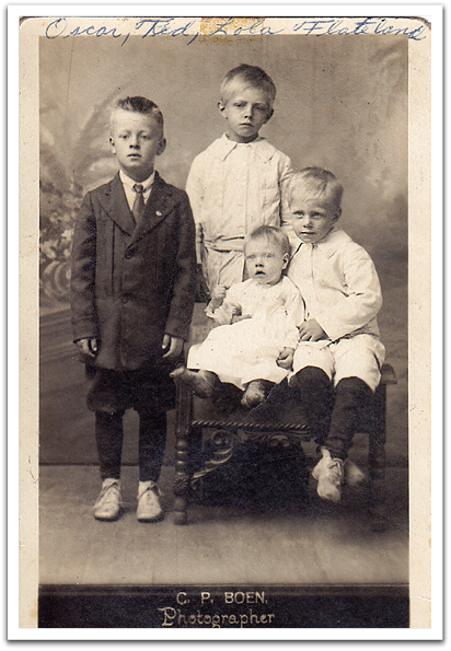 Standing, L-R: Bert Kvasager (cousin), Ted Flateland Sitting, L-R: Lola & Oscar Flateland 1918