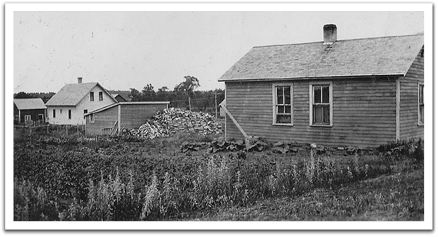 George and Maggie Reitter’s two-room house with the garden and large pile of wood ready for winter, about 1924.  The Reitters almost bought the house in the background in the early 1930s (the “Erickson” house),  but a closing scheduled for Friday the 13th spooked Maggie and the deal fell through.