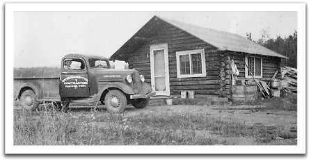 George Reitter with Wichterman-Reitter Contractors' pickup truck.