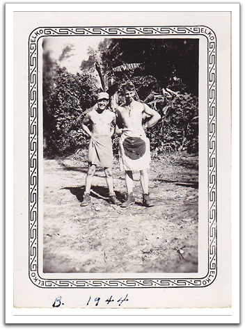 Oscar, on the right, trying on a Japanese flag for a skirt.