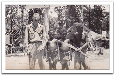 Oscar's buddy Mel Rasmussen with three natives in Bougainville. Mel was from Madison, Wisconsin, so their friendship continued after Oscar was discharged there.