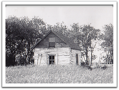 Log house built by Svein K Flateland in the late 1890s on his homestead in Chester Township, photo from 1947.
