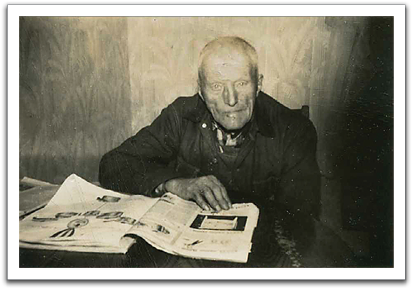 Ole K enjoying one of his magazines, probably sometime in the 1940s.