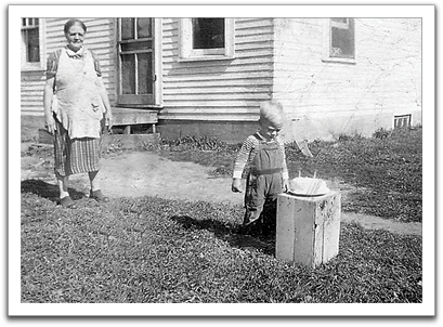 Grandma Anna Flateland and grandson Bruce Tinnesand on his 2nd birthday, 1944.