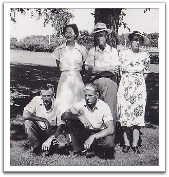 A summer outing, probably on a Sunday afternoon. Standing: Leona, Frank, Maggie. Sitting: Norris, Oscar.  Photo was likely taken by Helen.