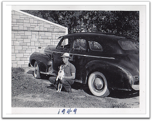 Oscar with Bingo, Christopherson’s dog from across the road, by Oscar & Helen’s 1941 Chevy parked in front of their garage.