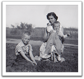 Byron and Myles with live-in "hired girl" Linda Hartmann, probably autumn, 1955.