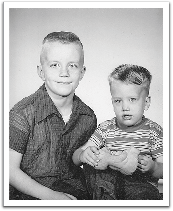 Byron & Myles with his rubber dog, probably in 1956.