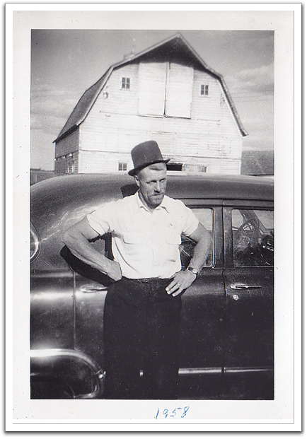 Oscar in the summer of 1958, with beard and hat for the Minnesota centennial celebration, in front of Bert Wilson's barn. Helen and Oscar were likely visiting on Chester township business.