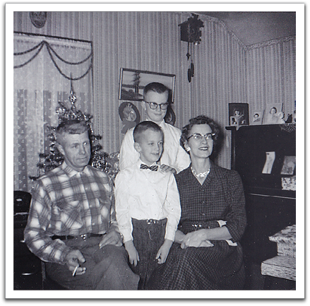 Oscar, Myles, Byron, Helen, Christmas, 1961, in the Van Tassel living room.