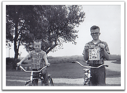 Myles and Byron, excited by the arrival of a comic book in the mail, summer, 1962.