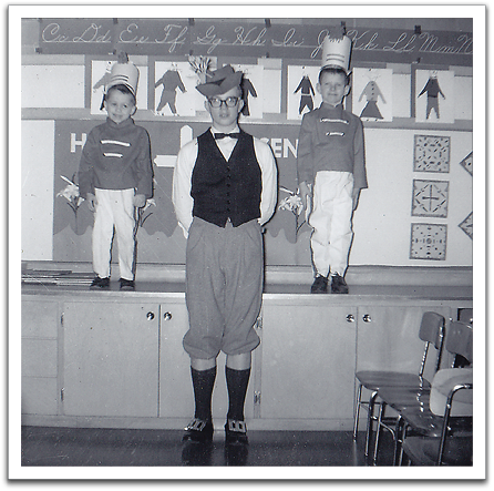 Byron in early 1963 with two unnamed younger kids,  getting ready for his role in the annual operetta.