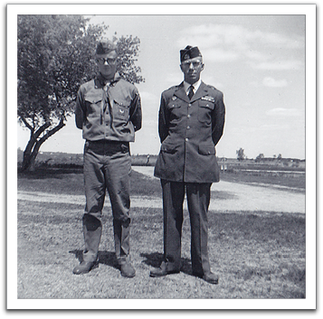 Father and son in uniform for the annual Memorial Day celebration in Trail, May 30, 1964,  Byron in his Boy Scout uniform, Oscar in his Army uniform.