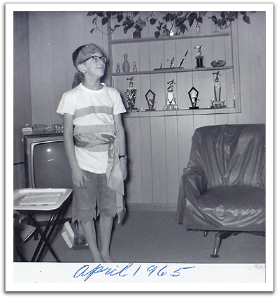 Myles dressed up for his role in an operetta, April, 1965. Some of Oscar’s bowling trophies are visible on the shelf behind.
