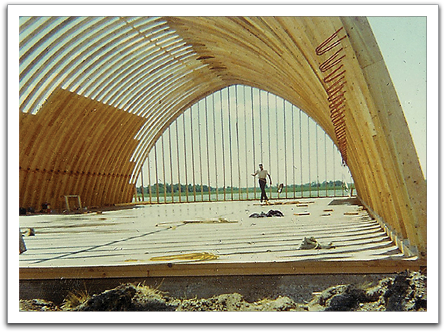 One of the quonsets under construction by Oscar and crew.