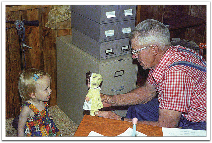 Kirsten playing with Oscar, J&B’s house, summer, 1979.