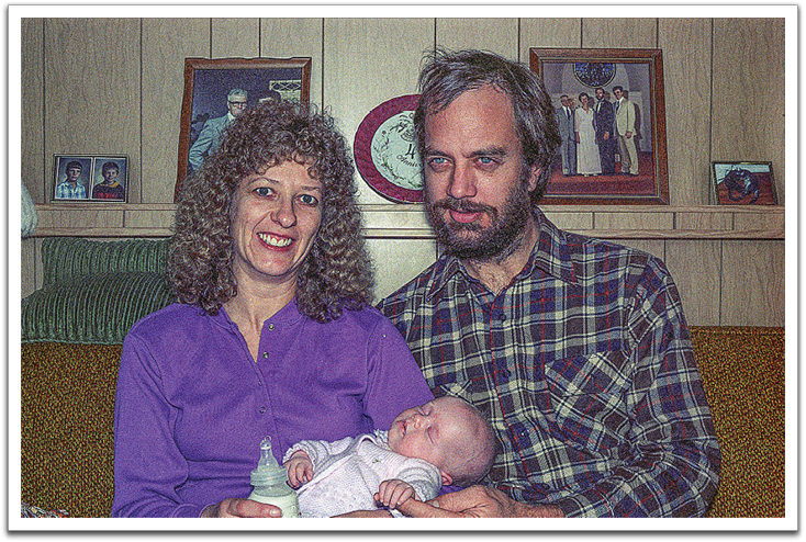 Myles & Bev holding Crystal, February 1989, Oscar & Helen’s house, Oklee.